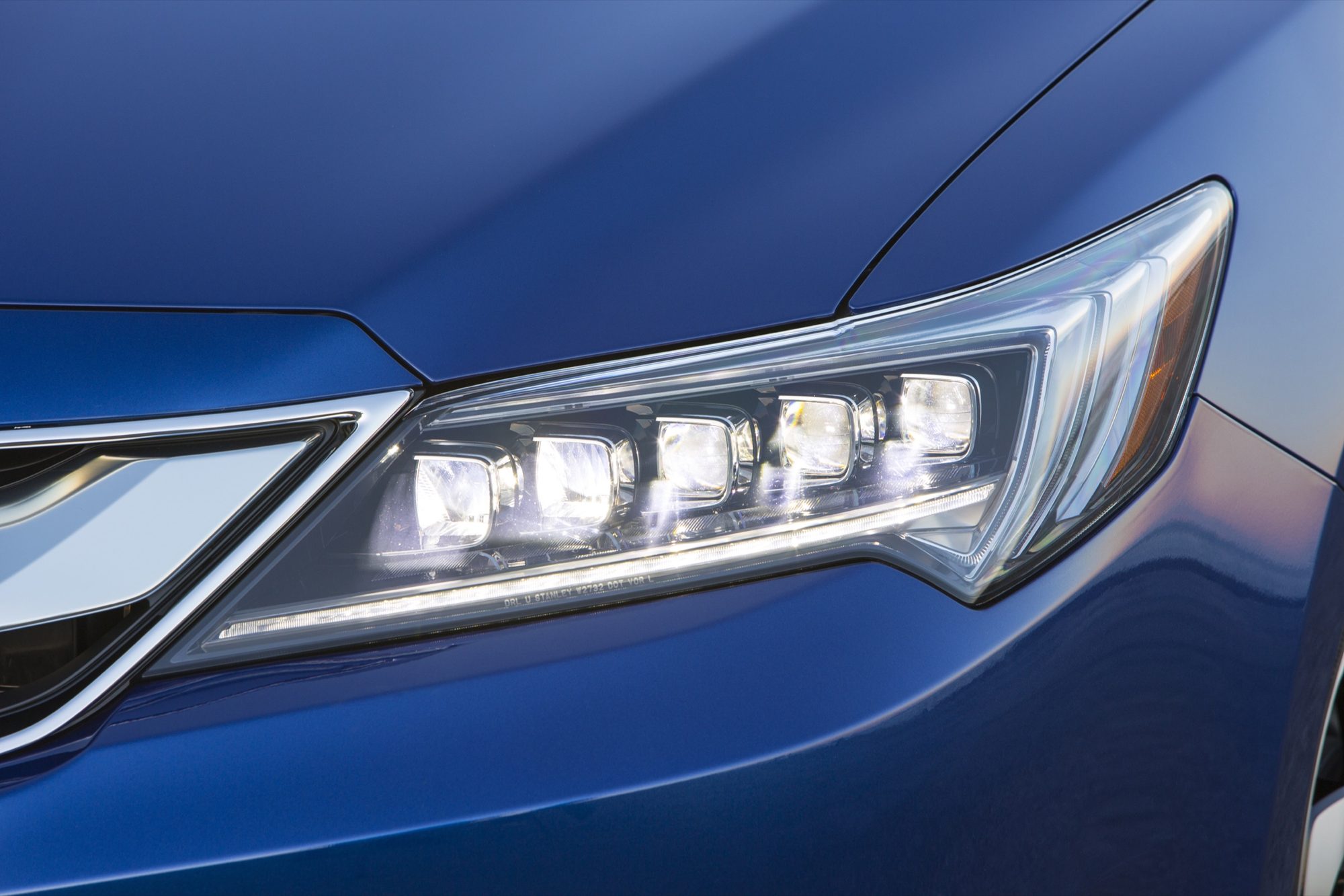 Jewel Eye LED headlight on a blue 2016 Acura ILX A-Spec