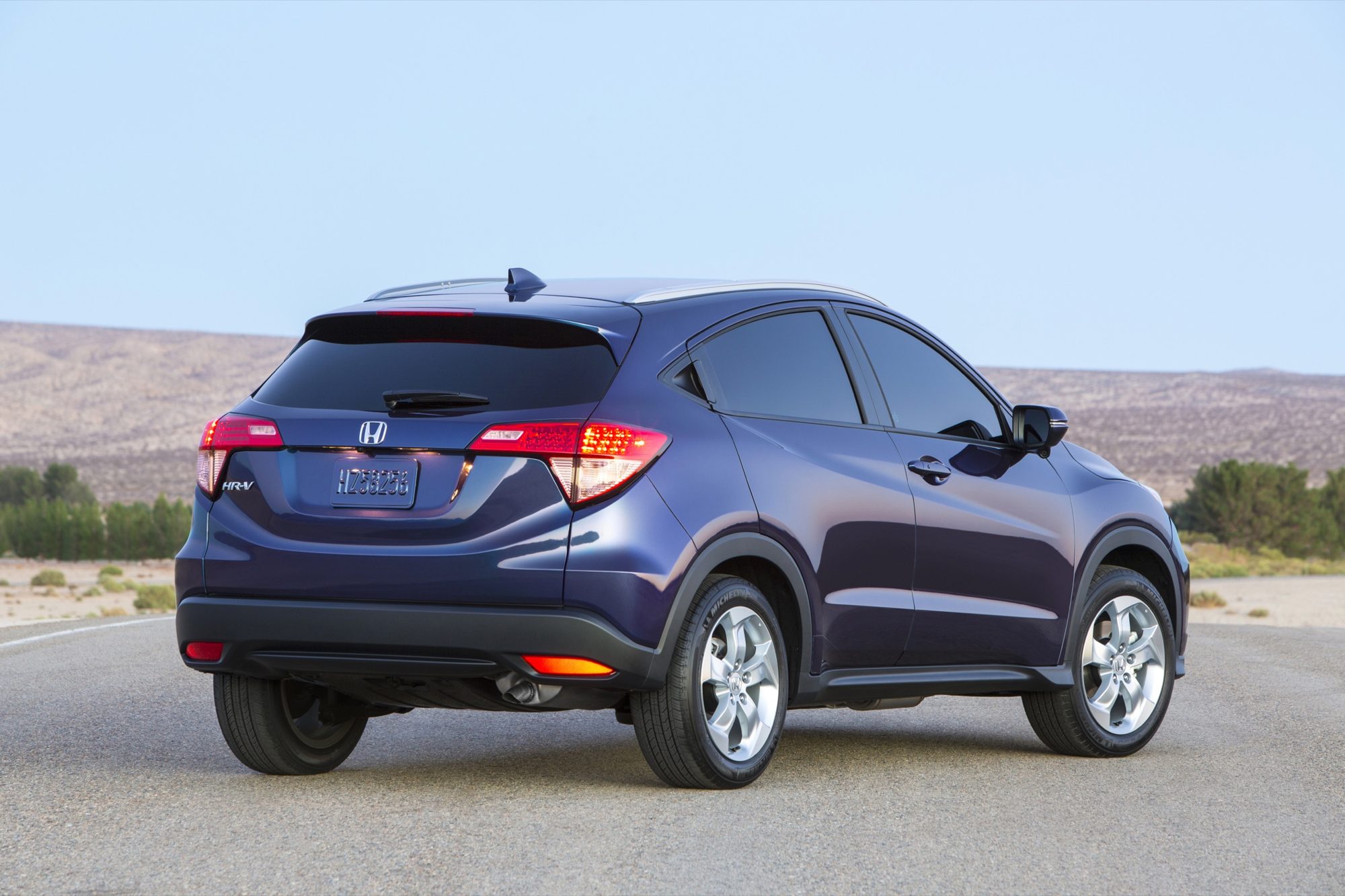 Rear three-quarter view of a blue 2016 Honda HR-V