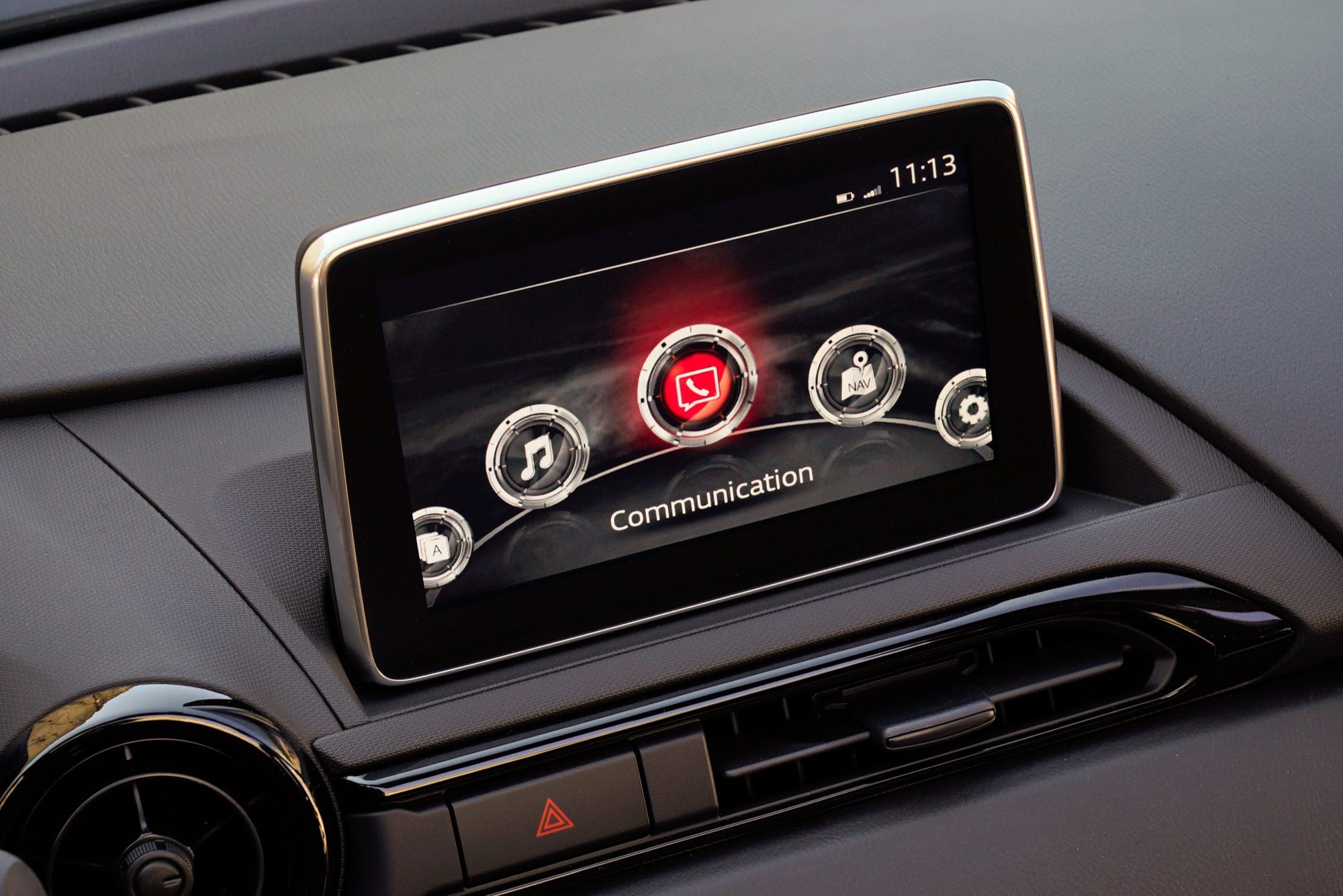 Seven-inch touchscreen on the dashboard of the 2016 Mazda MX-5 Miata Club