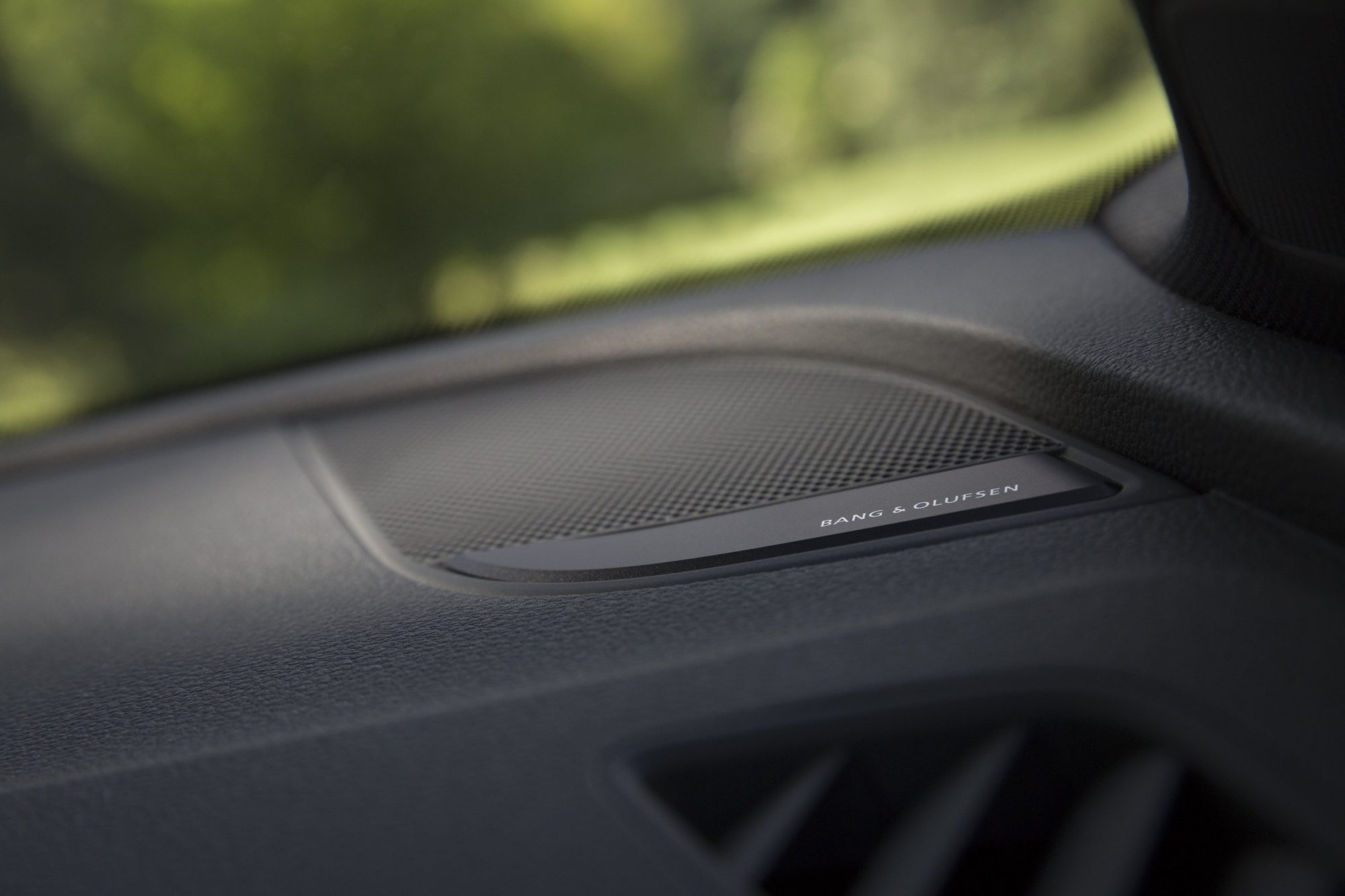 Bang & Olufsen speaker grille on the dashboard of the 2018 Audi A5 Coupe