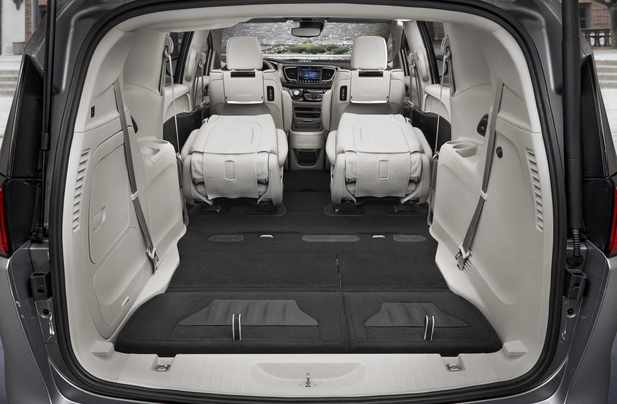 Cargo area of the 2019 Chrysler Pacifica Hybrid with the third row folded into the floor