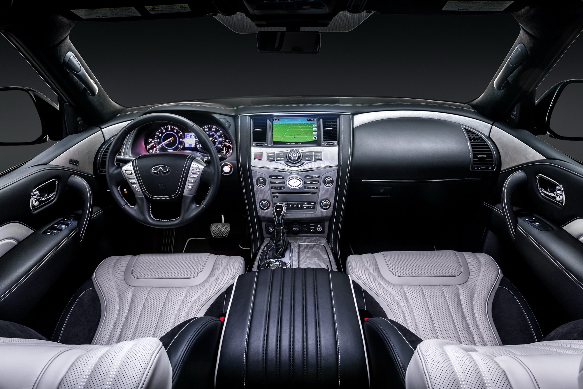 Front cabin of the 2019 Infiniti QX80 Limited with two-tone quilted leather seats