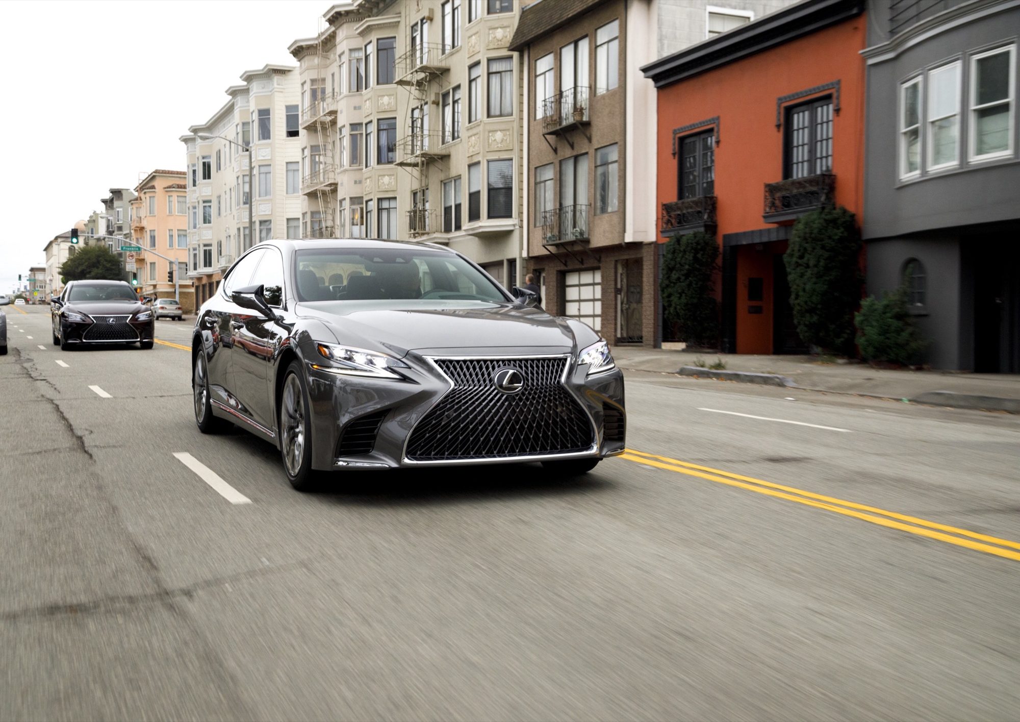 Gray 2019 Lexus LS 500 flagship sedan driving on a city street