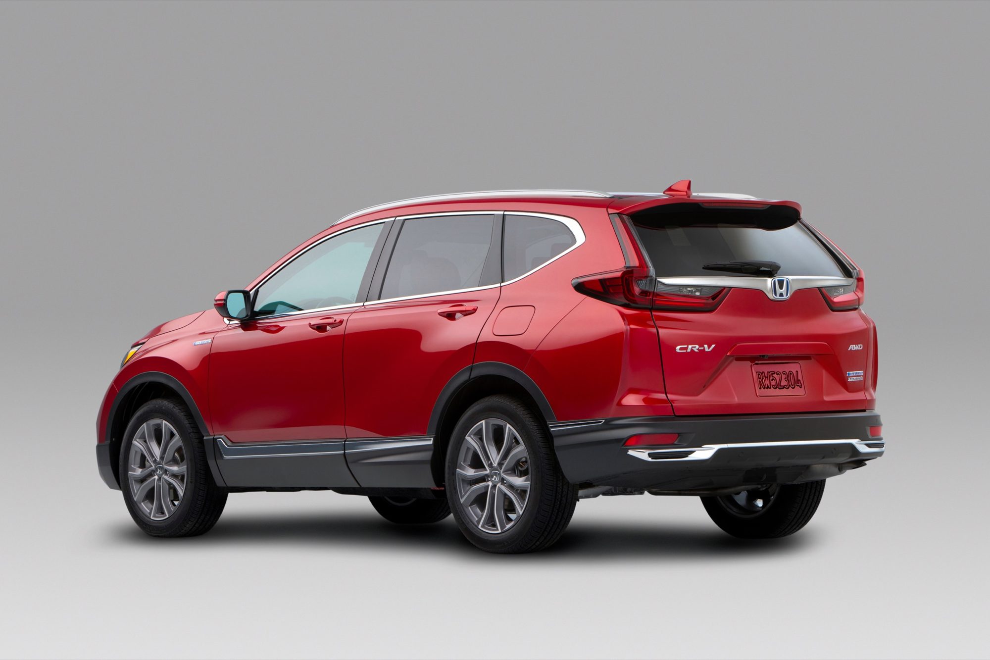 Rear three-quarter view of a red 2020 Honda CR-V Hybrid Touring