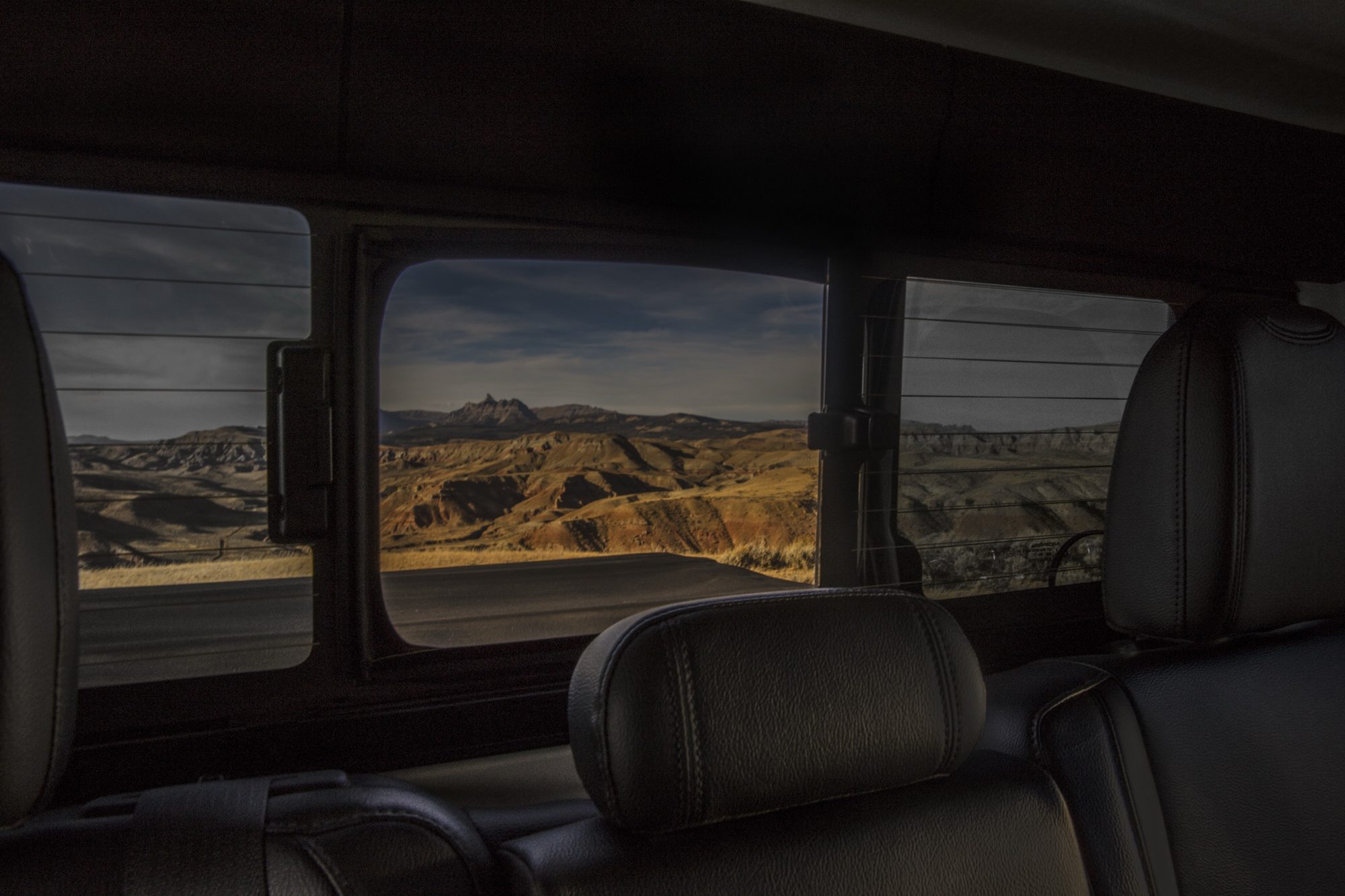 Black leather rear seat and rear window of the 2020 Jeep Gladiator Overland