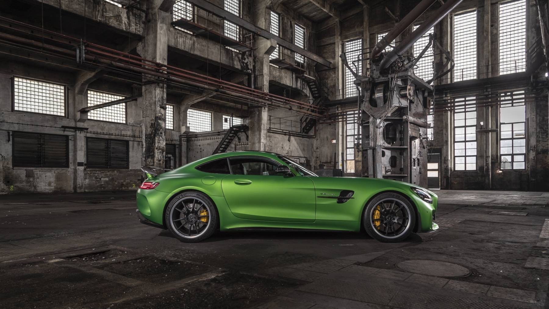 2020 Mercedes-AMG GT R Coupe Review: Defines beauty with pricey flaws 5 Side profile of a green 2020 Mercedes-AMG GT R coupe in an old factory hall