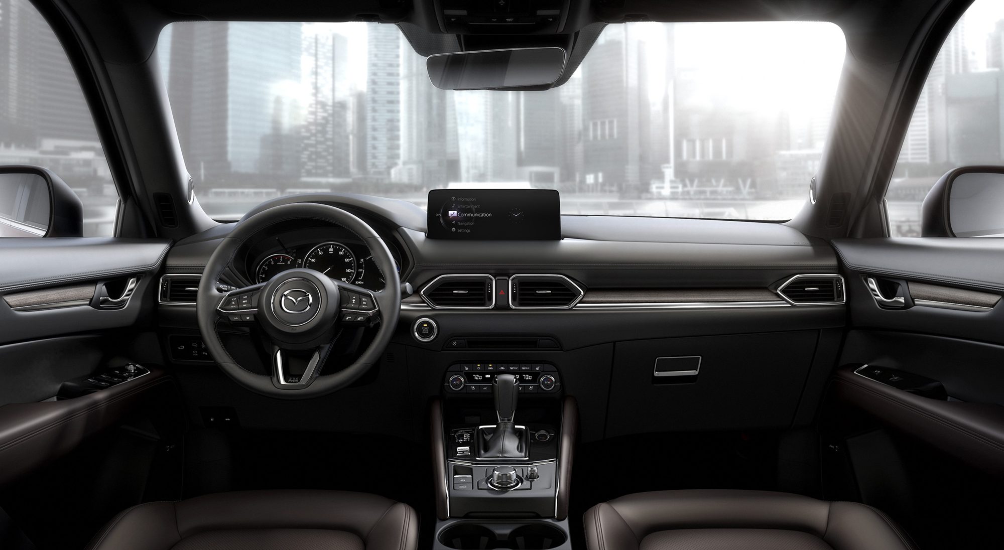 Dashboard of the 2021 Mazda CX-5 with its 10.25-inch center display and brown leather