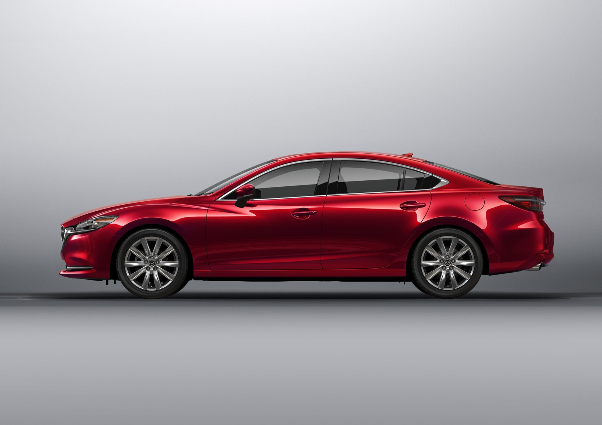 Side profile of a red 2021 Mazda6 sedan