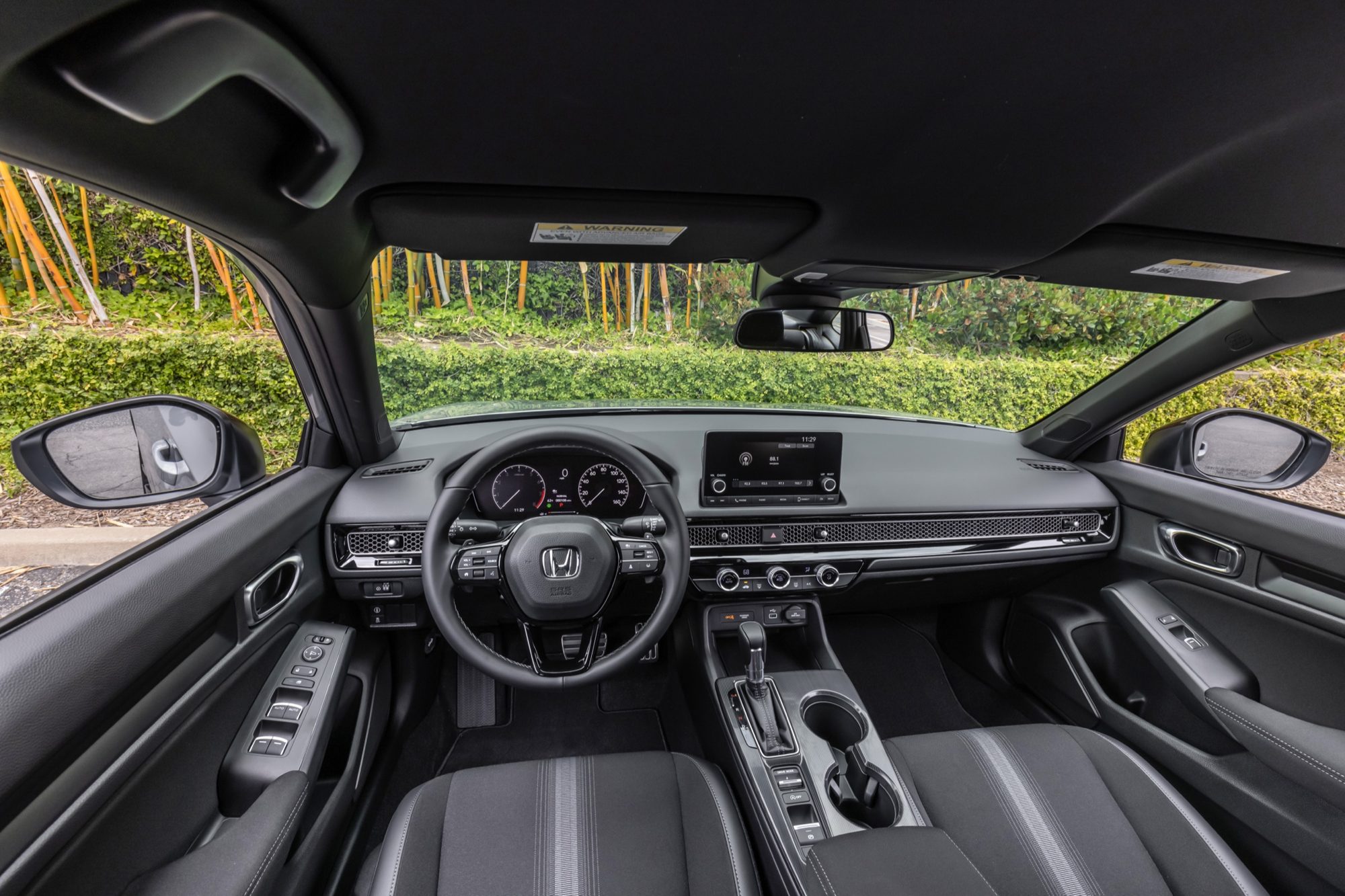 Dashboard and front seats of the 2022 Honda Civic Sport sedan
