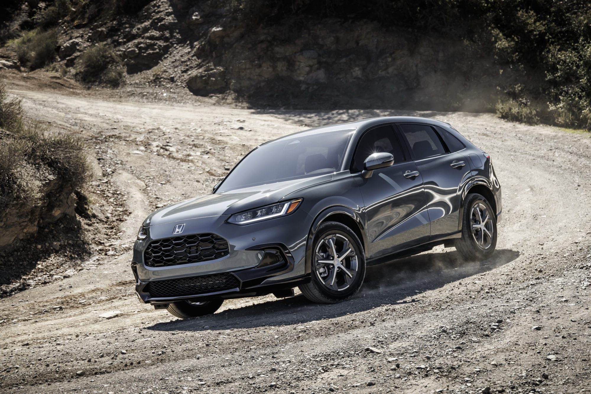 Gray 2023 Honda HR-V EX-L driving on a dirt road