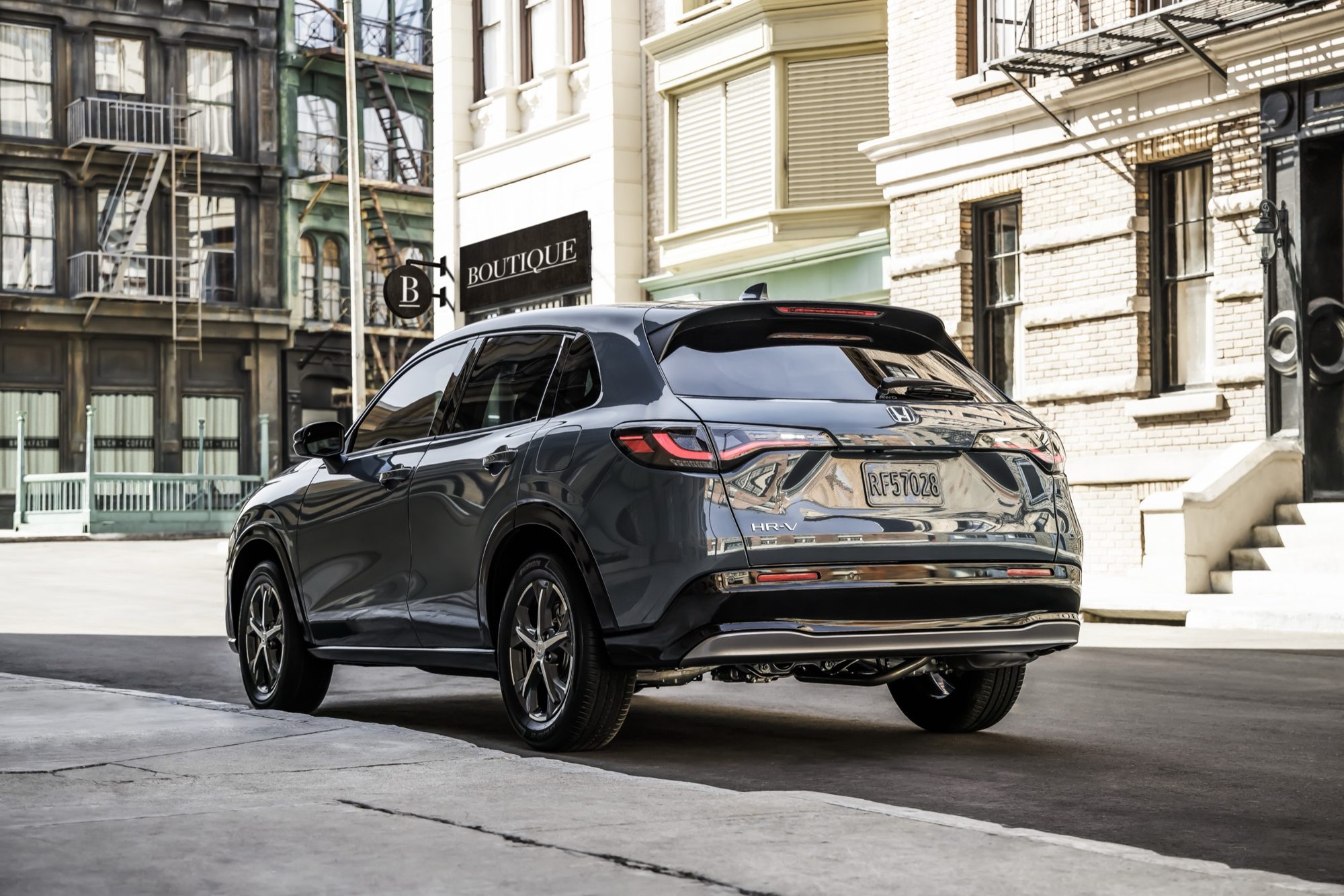 Rear three-quarter view of a gray 2023 Honda HR-V EX-L