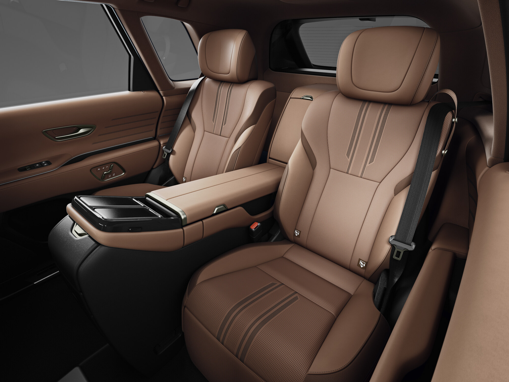 Toyota Brought the Century to Detroit and Called It a Global Model 3 Rear cabin of the Toyota Century with two individual brown leather seats separated by a full-length console