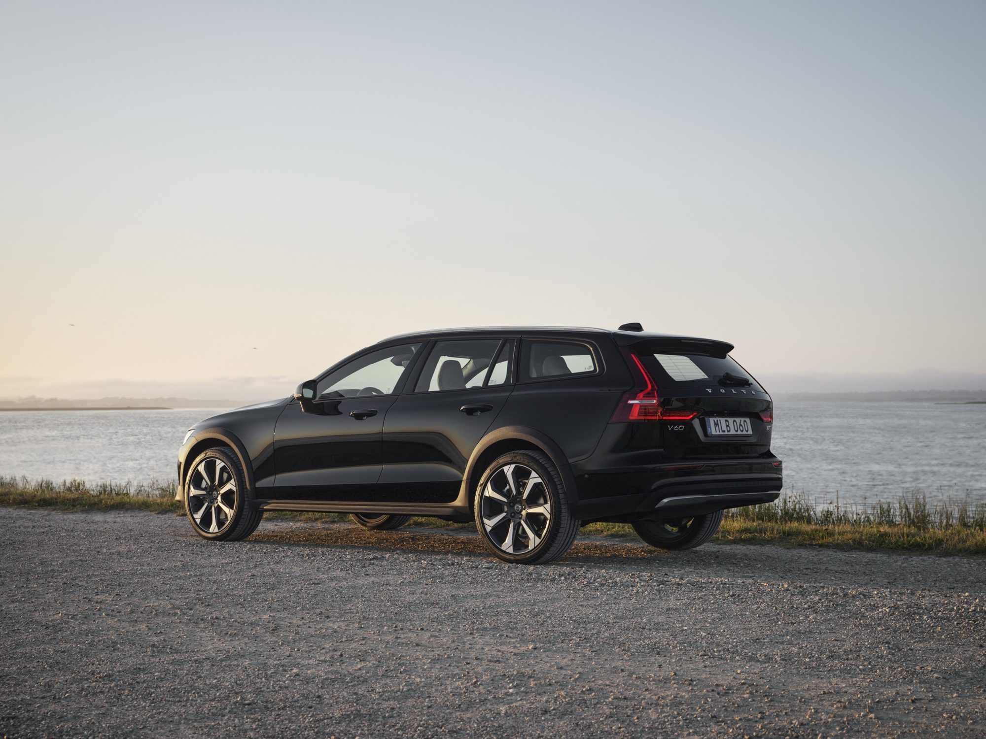 Rear three-quarter view of a 2023 Volvo V60 Cross Country B5 AWD in Onyx Black