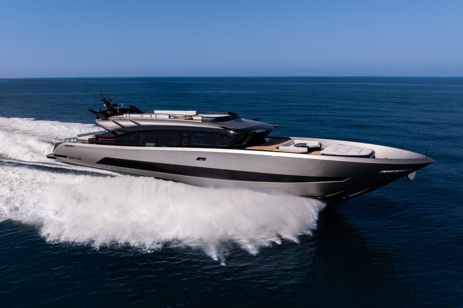 Brabus Now Sells a 110-Foot Yacht With Up to 7,800 HP and a 48-Knot Top Speed 1 Gray Brabus AB110 yacht running at speed on open water, side view