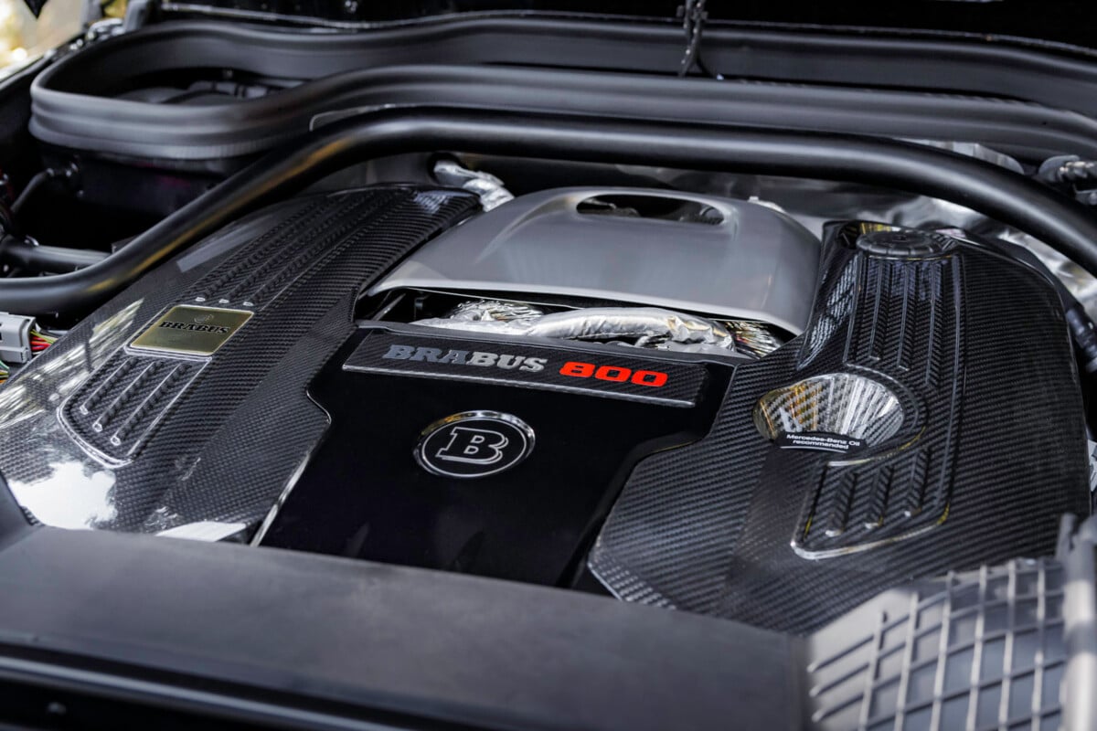 Brabus 800 engine cover in carbon fiber with red 800 lettering under the hood of a Brabus XL 800