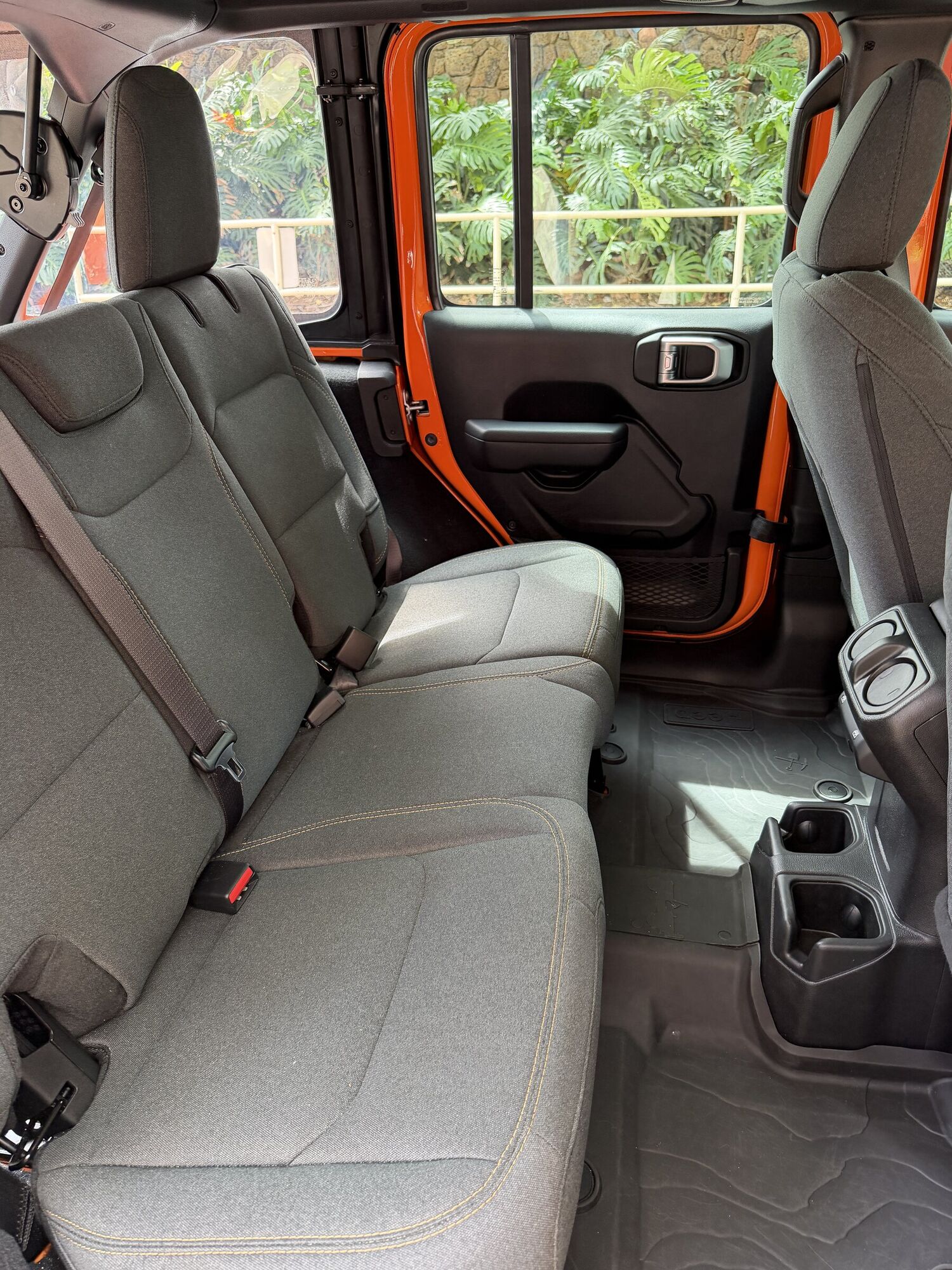 Driving Oahu in a 2026 Jeep Wrangler, From Blue Skies to Hurricane Weather 9 Rear cloth bench seat of a 2026 Jeep Wrangler Sport 4-door