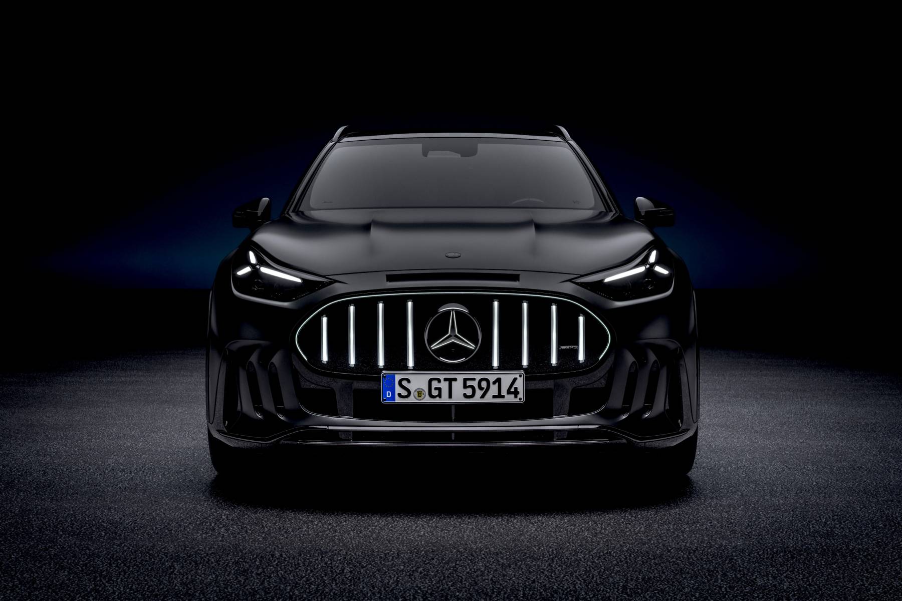 The 1,153-HP Mercedes-AMG GT SUV Plays Back a Recorded AMG V8 4 Head-on view of a black 2028 Mercedes-AMG GT SUV with its illuminated vertical-bar grille and slim headlights