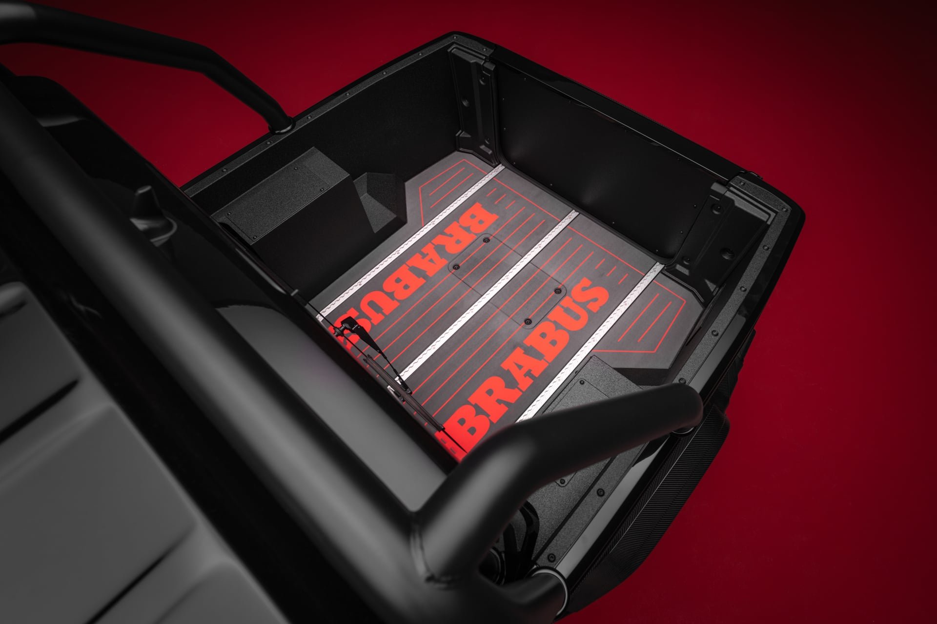 Bed of the Brabus P 900 Rocket Edition with soft-teak decking and red Brabus lettering