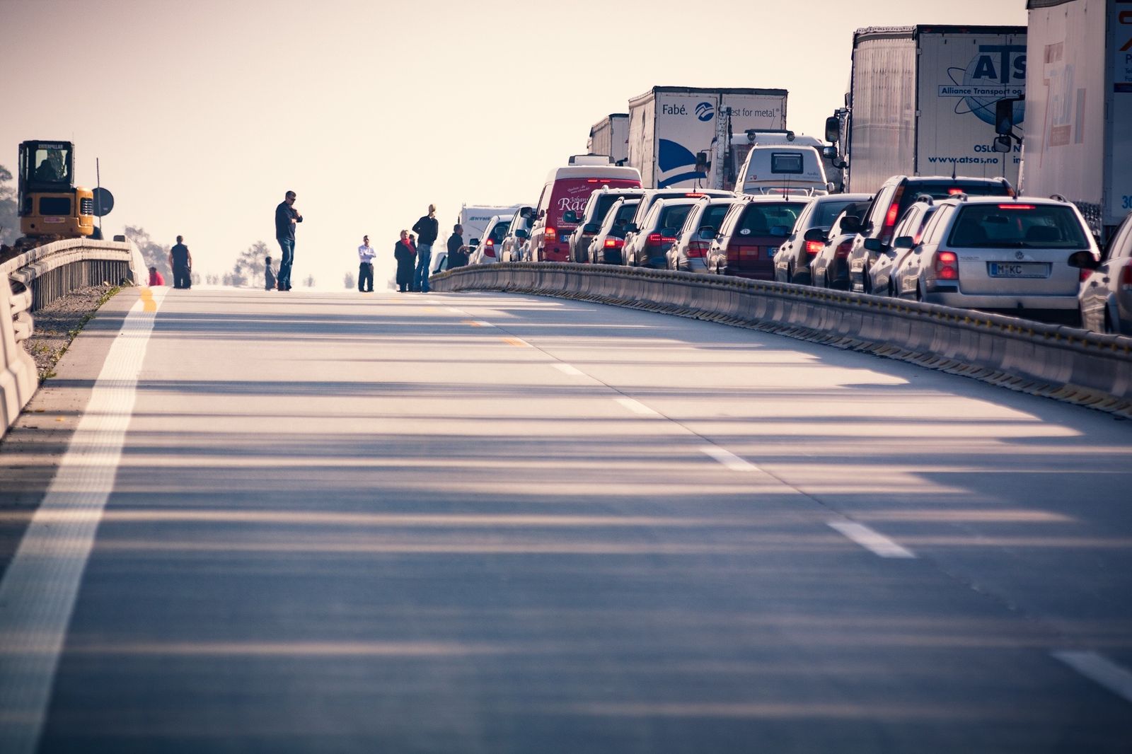 Claims From Serious Car Collisions Demand Strong Medical Evidence 2 Cars and trucks backed up on a congested highway