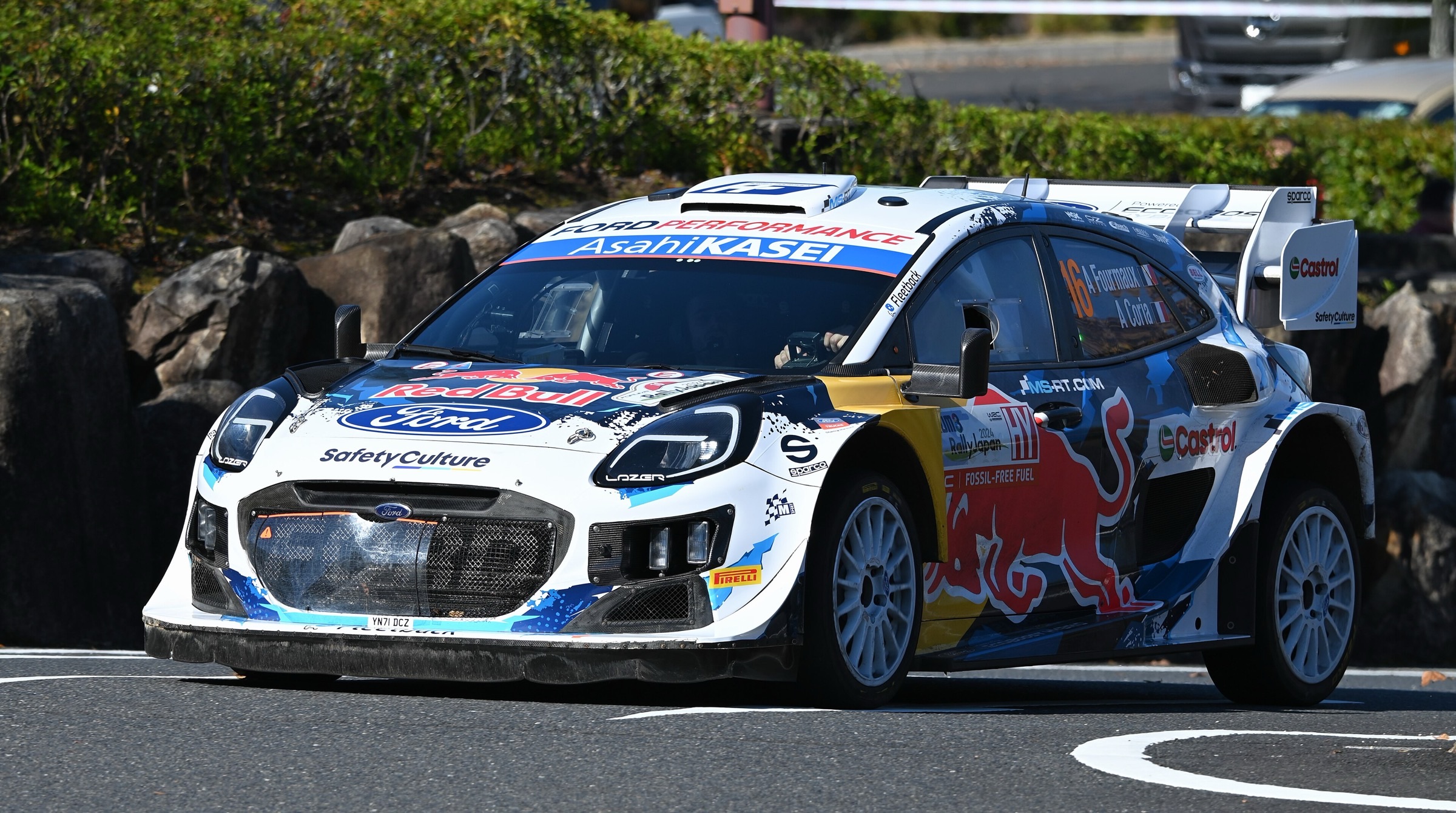 White, blue and red M-Sport Ford Puma Rally1 number 16 on tarmac at Rally Japan 2024