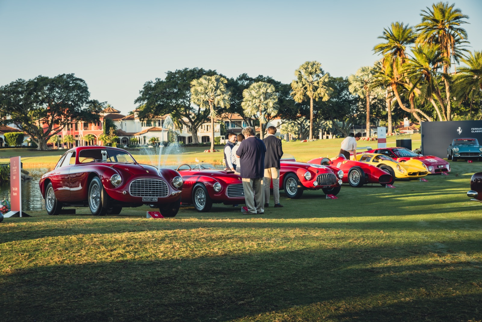 Early Ferrari racing cars from the late 1940s and 1950s parked beside a fountain at The Boca Raton during the 2026 Palm Beach Cavallino Classic