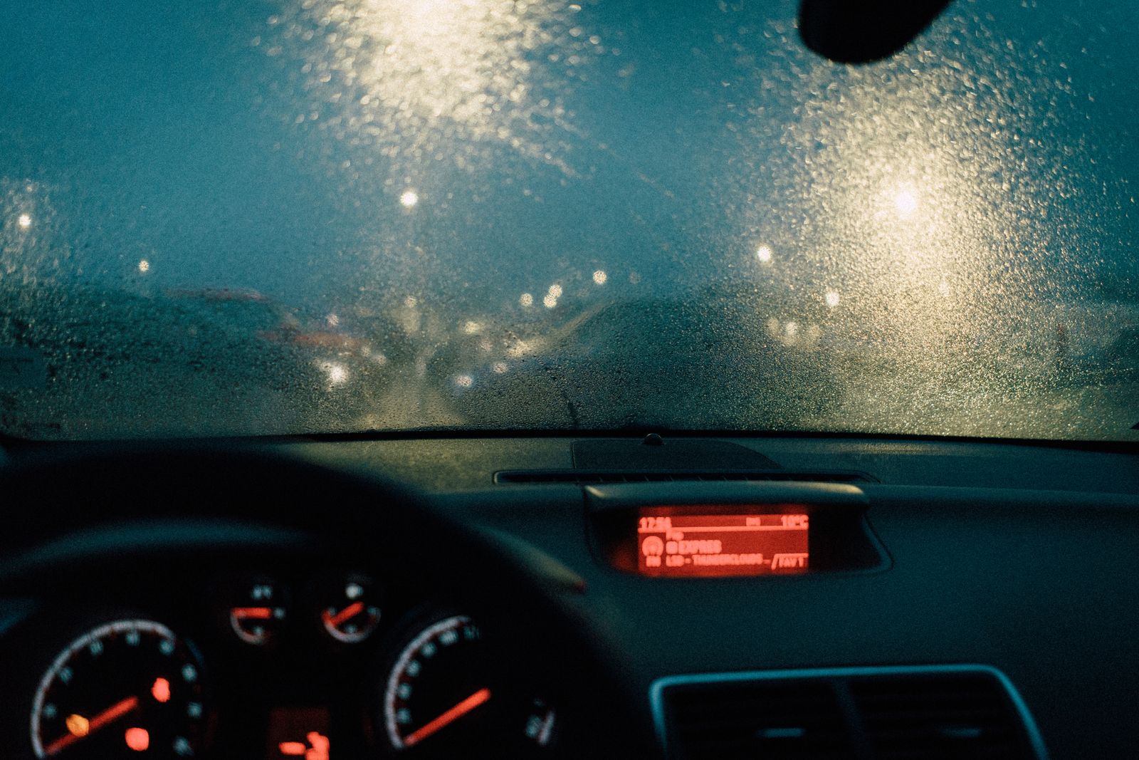 How to Strengthen a PTSD Disability Claim Before Submitting It 1 Rain on a car windshield at night with the dashboard gauges lit