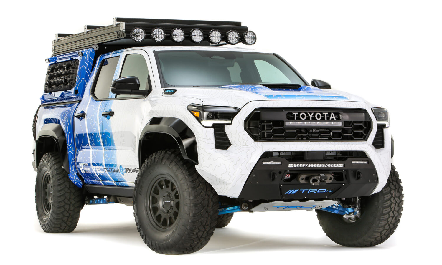 Toyota Tacoma H2-Overlander Concept, a hydrogen fuel-cell pickup with a roof rack and light bar, from the 2025 SEMA Show