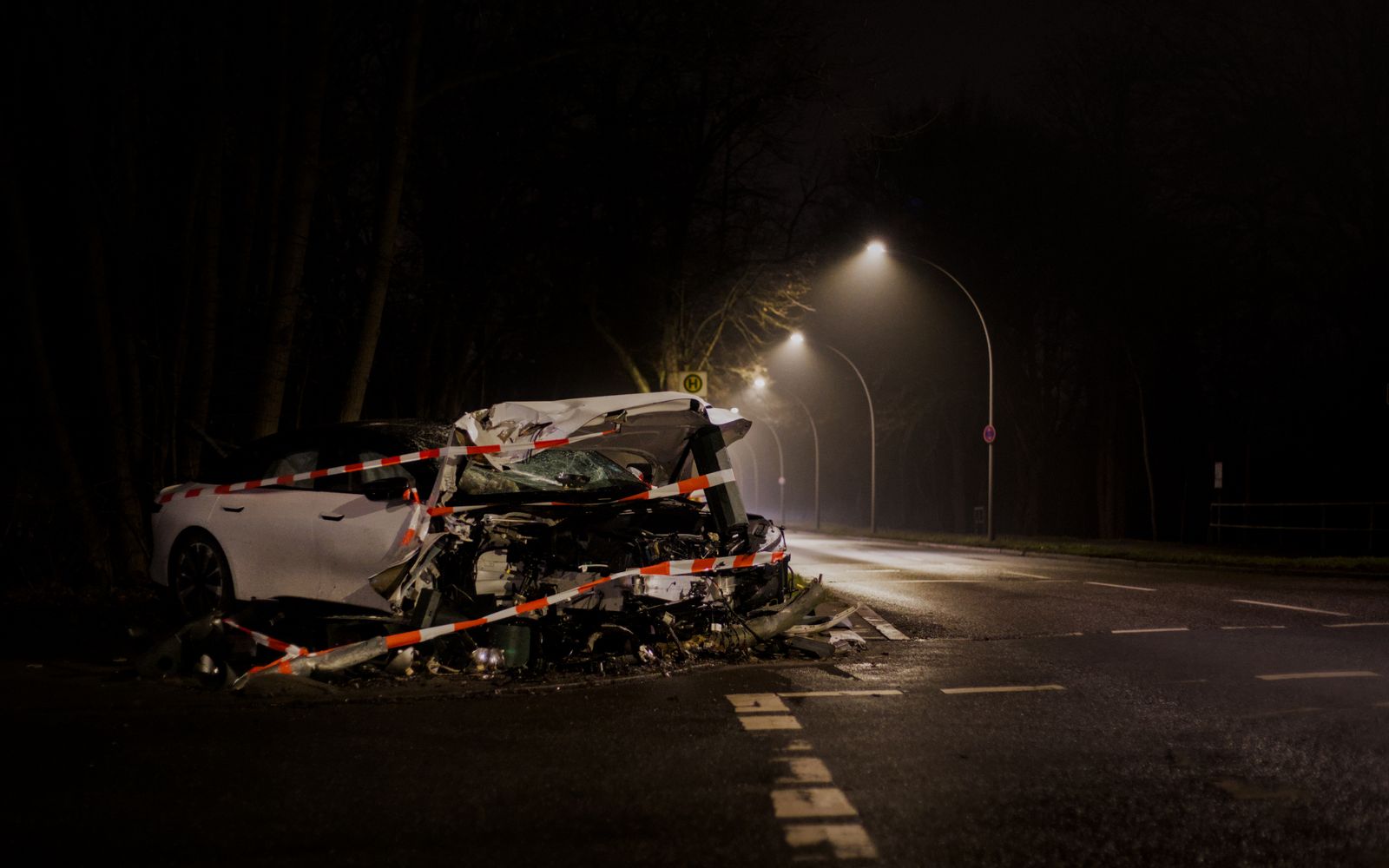 Claims From Serious Car Collisions Demand Strong Medical Evidence 1 Wrecked white car taped off on a foggy street at night