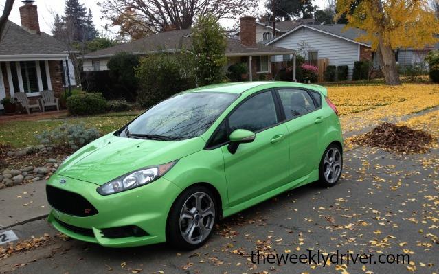 The 2013 Ford Fiesta has an exterior color of bright lime green.