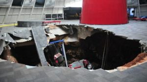 A sink hole in a car museum has eaten eight rare Corvettes