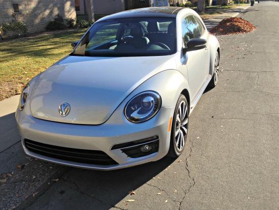 2014 Volkswagen Beetle is similar but also much different than Bugs and Beetles of yesteryear.